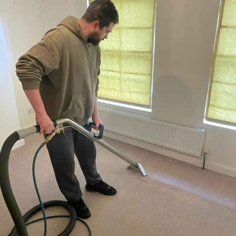 Merlin's technician deep cleaning a carpet