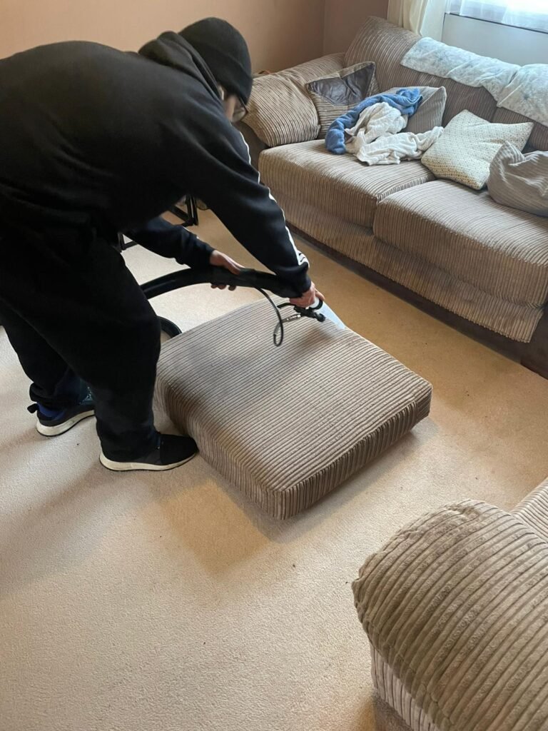 Upholstery cleaning in progress by Merlin's Carpet Cleaning