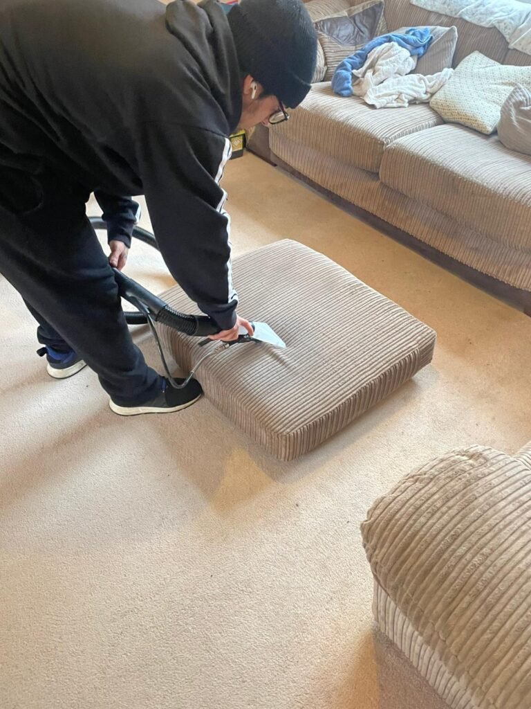Merlin's technician cleaning stair carpet